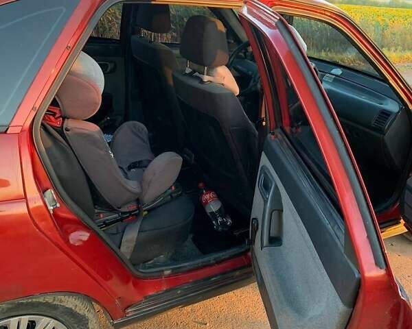 ВАЗ 2112 2007 в Ольшанка на Automoto.ua Красный ВАЗ 2112, объемом двигателя 1.6 л и пробегом 246 тыс. км за 2400 $, фото 9 на Automoto.ua