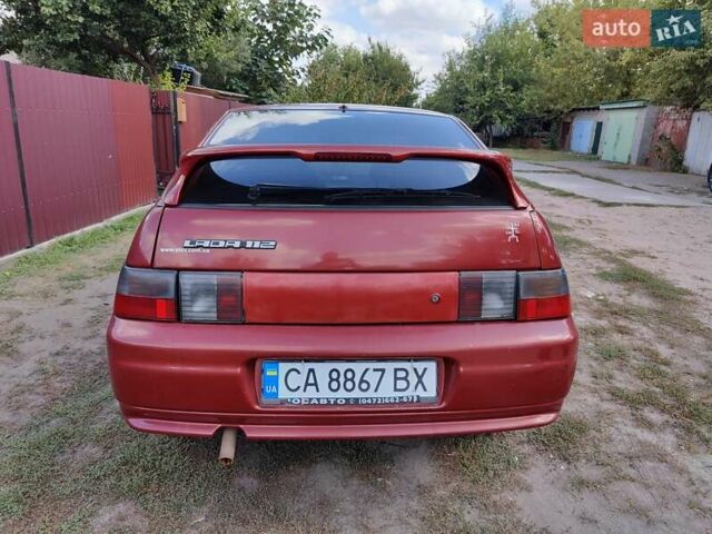 Красный ВАЗ 2112, объемом двигателя 1.6 л и пробегом 161 тыс. км за 1600 $, фото 5 на Automoto.ua