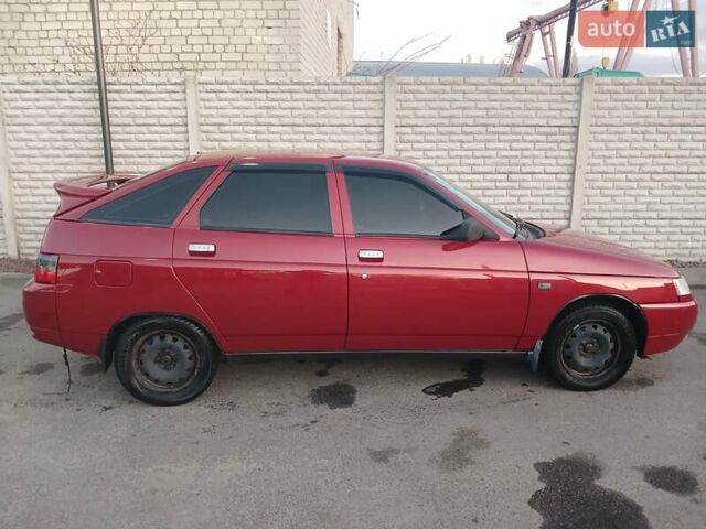 Красный ВАЗ 2112, объемом двигателя 1.6 л и пробегом 121 тыс. км за 3000 $, фото 6 на Automoto.ua