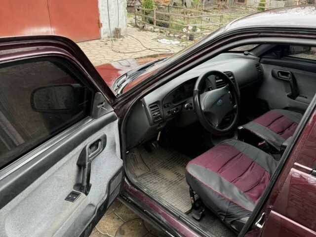 Красный ВАЗ 2112, объемом двигателя 1.6 л и пробегом 240 тыс. км за 2600 $, фото 4 на Automoto.ua