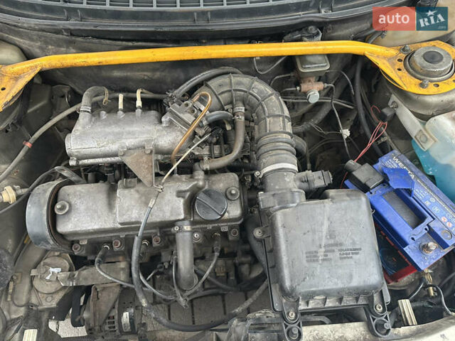 Серый ВАЗ 2112, объемом двигателя 1.5 л и пробегом 227 тыс. км за 550 $, фото 6 на Automoto.ua