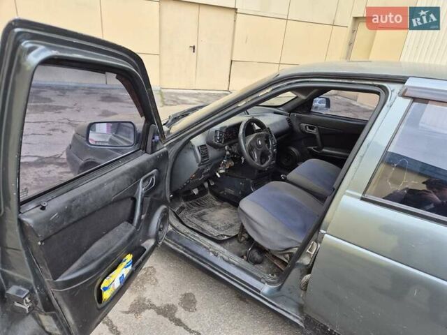 Серый ВАЗ 2112, объемом двигателя 1.5 л и пробегом 250 тыс. км за 699 $, фото 5 на Automoto.ua