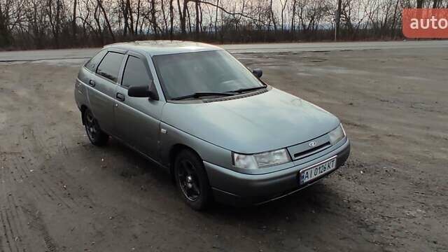 Серый ВАЗ 2112, объемом двигателя 1.5 л и пробегом 300 тыс. км за 1600 $, фото 2 на Automoto.ua