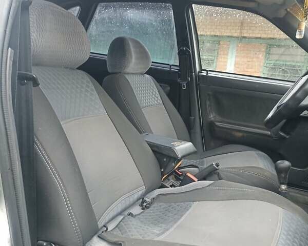 Серый ВАЗ 2112, объемом двигателя 1.5 л и пробегом 200 тыс. км за 750 $, фото 2 на Automoto.ua