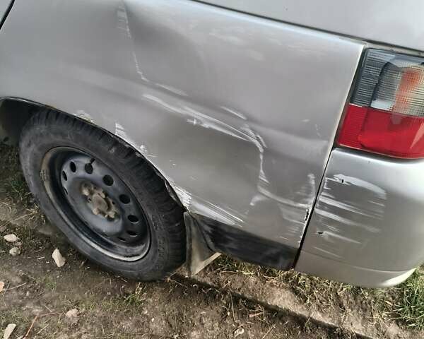 Серый ВАЗ 2112, объемом двигателя 1.5 л и пробегом 226 тыс. км за 1100 $, фото 3 на Automoto.ua