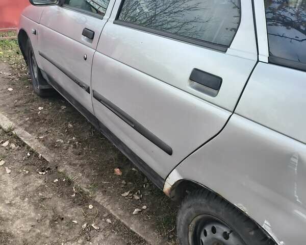 Серый ВАЗ 2112, объемом двигателя 1.5 л и пробегом 226 тыс. км за 1100 $, фото 4 на Automoto.ua