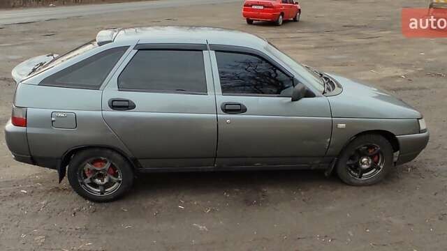 Серый ВАЗ 2112, объемом двигателя 1.5 л и пробегом 300 тыс. км за 1600 $, фото 3 на Automoto.ua