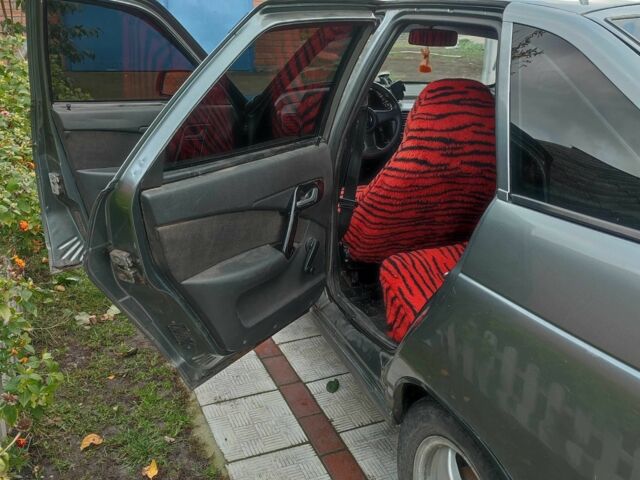 Серый ВАЗ 2112, объемом двигателя 1.5 л и пробегом 250 тыс. км за 1432 $, фото 8 на Automoto.ua