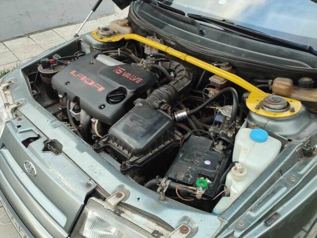 Серый ВАЗ 2112, объемом двигателя 1.5 л и пробегом 250 тыс. км за 1432 $, фото 10 на Automoto.ua