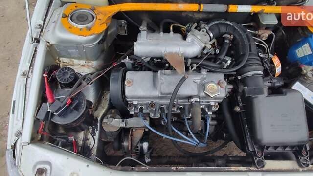 Серый ВАЗ 2112, объемом двигателя 1.5 л и пробегом 350 тыс. км за 1900 $, фото 23 на Automoto.ua