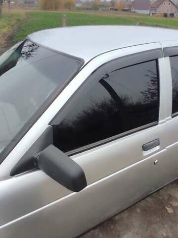 Серый ВАЗ 2112, объемом двигателя 1.5 л и пробегом 350 тыс. км за 1900 $, фото 11 на Automoto.ua