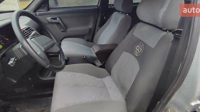 Серый ВАЗ 2112, объемом двигателя 1.5 л и пробегом 350 тыс. км за 1900 $, фото 17 на Automoto.ua