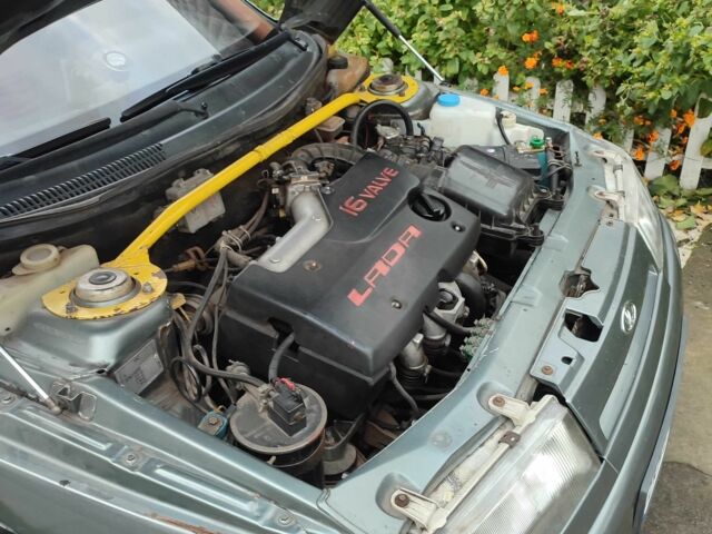 Серый ВАЗ 2112, объемом двигателя 1.5 л и пробегом 250 тыс. км за 1432 $, фото 9 на Automoto.ua