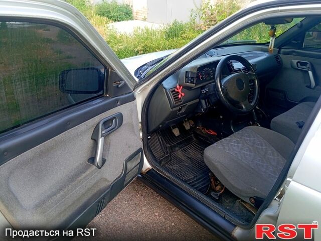 Серый ВАЗ 2112, объемом двигателя 1.6 л и пробегом 217 тыс. км за 1800 $, фото 3 на Automoto.ua