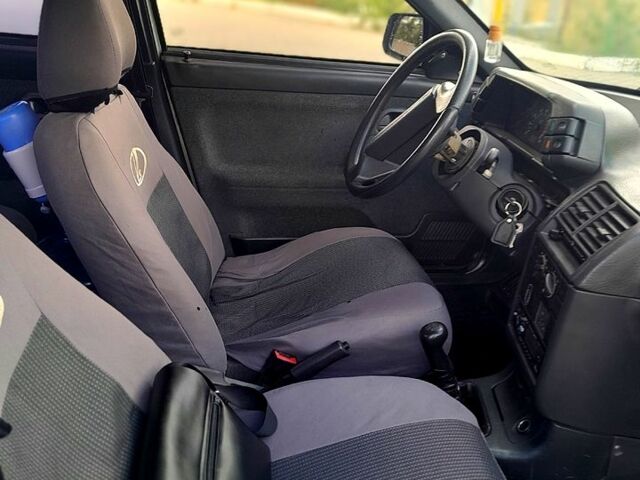 Сірий ВАЗ 2112, об'ємом двигуна 1.6 л та пробігом 250 тис. км за 1299 $, фото 6 на Automoto.ua