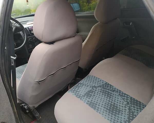 Серый ВАЗ 2112, объемом двигателя 1.6 л и пробегом 329 тыс. км за 1650 $, фото 3 на Automoto.ua