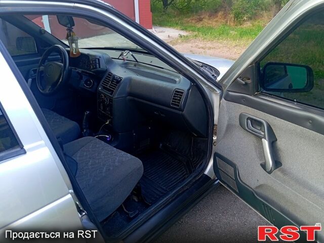 Серый ВАЗ 2112, объемом двигателя 1.6 л и пробегом 217 тыс. км за 1800 $, фото 5 на Automoto.ua