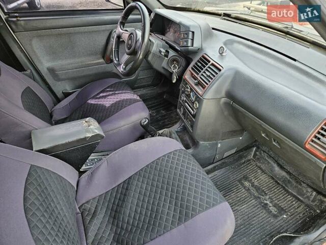 Сірий ВАЗ 2112, об'ємом двигуна 1.6 л та пробігом 231 тис. км за 1750 $, фото 9 на Automoto.ua