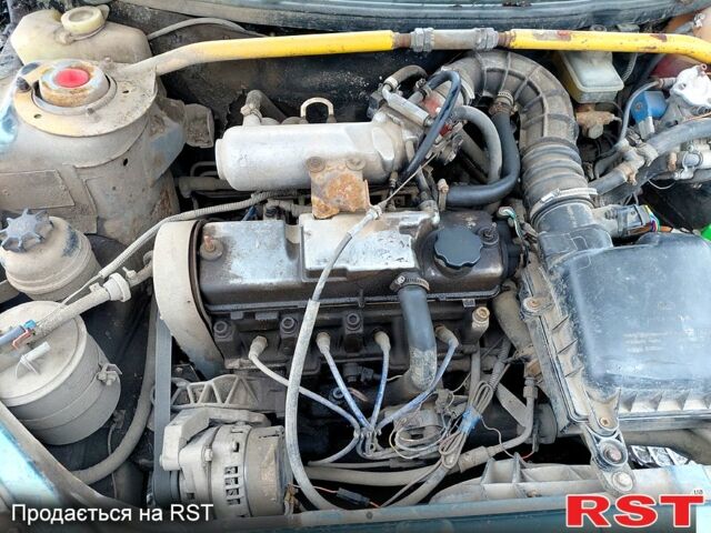 Серый ВАЗ 2112, объемом двигателя 1.5 л и пробегом 200 тыс. км за 900 $, фото 1 на Automoto.ua