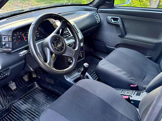 Серый ВАЗ 2112, объемом двигателя 1.6 л и пробегом 222 тыс. км за 1800 $, фото 1 на Automoto.ua