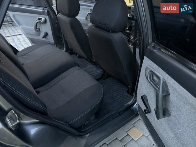 Серый ВАЗ 2112, объемом двигателя 1.6 л и пробегом 310 тыс. км за 2599 $, фото 5 на Automoto.ua