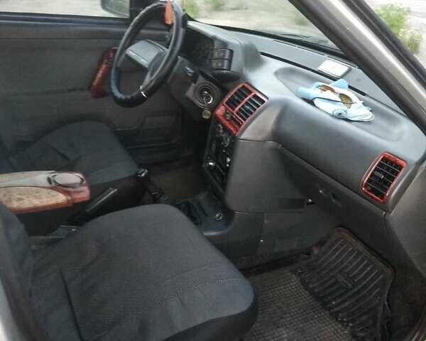 Серый ВАЗ 2112, объемом двигателя 1.6 л и пробегом 213 тыс. км за 2350 $, фото 9 на Automoto.ua