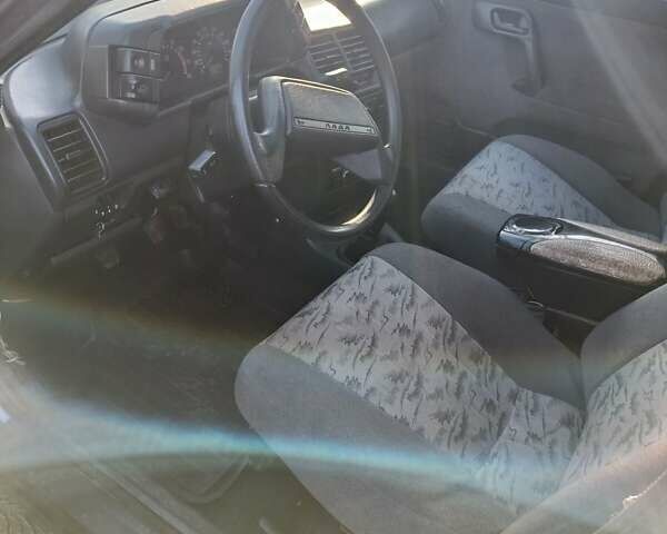 Серый ВАЗ 2112, объемом двигателя 1.6 л и пробегом 200 тыс. км за 1750 $, фото 5 на Automoto.ua