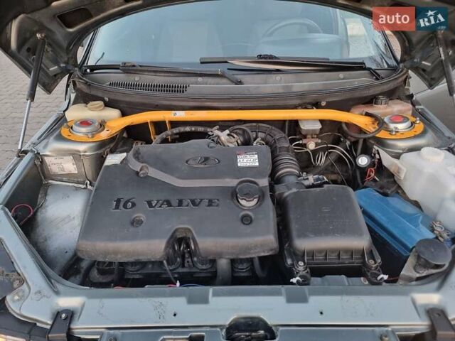 Серый ВАЗ 2112, объемом двигателя 1.6 л и пробегом 301 тыс. км за 2000 $, фото 5 на Automoto.ua