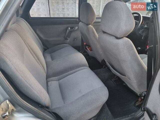 Серый ВАЗ 2112, объемом двигателя 1.6 л и пробегом 301 тыс. км за 2000 $, фото 2 на Automoto.ua