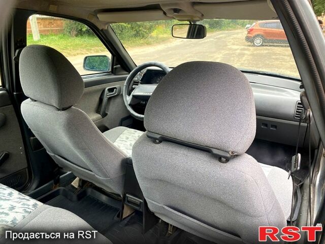 Серый ВАЗ 2112, объемом двигателя 1.6 л и пробегом 270 тыс. км за 2100 $, фото 5 на Automoto.ua