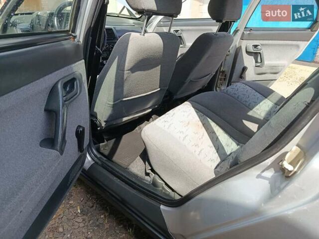 Сірий ВАЗ 2112, об'ємом двигуна 1.6 л та пробігом 185 тис. км за 1999 $, фото 21 на Automoto.ua