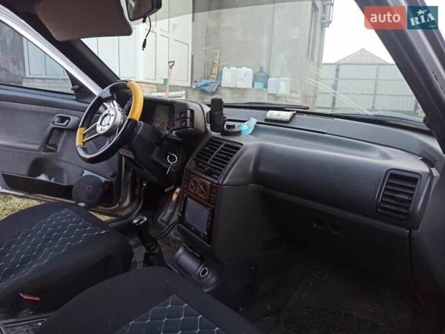 Серый ВАЗ 2112, объемом двигателя 1.6 л и пробегом 500 тыс. км за 1500 $, фото 4 на Automoto.ua