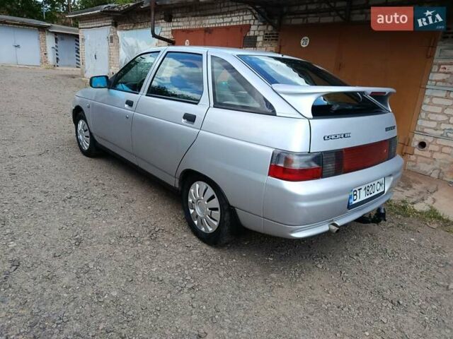 Сірий ВАЗ 2112, об'ємом двигуна 1.6 л та пробігом 185 тис. км за 1999 $, фото 1 на Automoto.ua