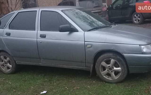 Серый ВАЗ 2112, объемом двигателя 1.6 л и пробегом 250 тыс. км за 500 $, фото 2 на Automoto.ua