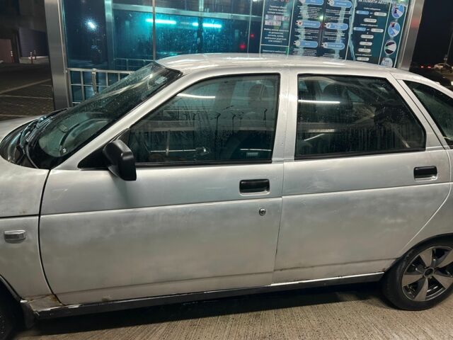 Серый ВАЗ 2112, объемом двигателя 2 л и пробегом 326 тыс. км за 1399 $, фото 1 на Automoto.ua