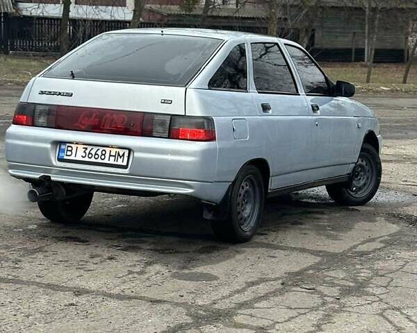 Серый ВАЗ 2112, объемом двигателя 1.6 л и пробегом 180 тыс. км за 1850 $, фото 2 на Automoto.ua