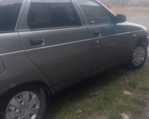 Серый ВАЗ 2112, объемом двигателя 1.6 л и пробегом 340 тыс. км за 1300 $, фото 1 на Automoto.ua