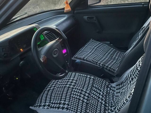 Серый ВАЗ 2112, объемом двигателя 1.6 л и пробегом 340 тыс. км за 1500 $, фото 4 на Automoto.ua