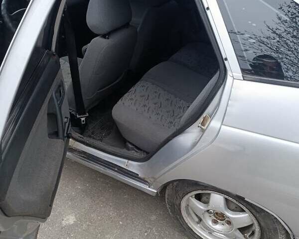 Серый ВАЗ 2112, объемом двигателя 1.6 л и пробегом 173 тыс. км за 950 $, фото 6 на Automoto.ua