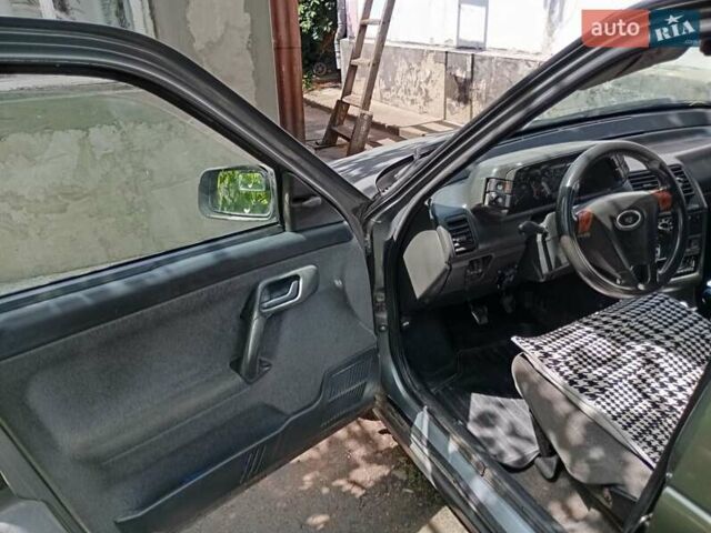 Сірий ВАЗ 2112, об'ємом двигуна 1.6 л та пробігом 321 тис. км за 2050 $, фото 5 на Automoto.ua