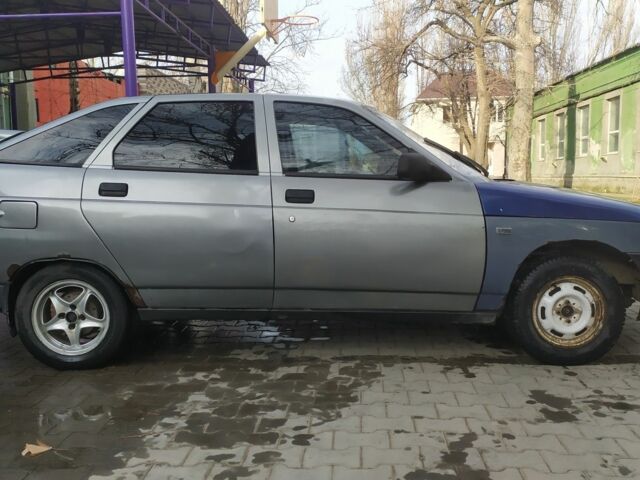 Серый ВАЗ 2112, объемом двигателя 1.6 л и пробегом 343 тыс. км за 1055 $, фото 1 на Automoto.ua