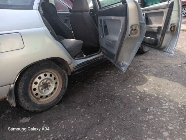 Серый ВАЗ 2112, объемом двигателя 7 л и пробегом 240 тыс. км за 500 $, фото 5 на Automoto.ua