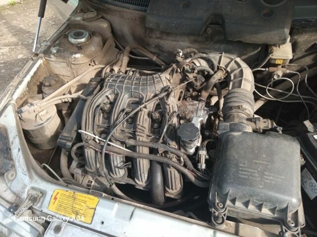 Серый ВАЗ 2112, объемом двигателя 7 л и пробегом 240 тыс. км за 500 $, фото 6 на Automoto.ua