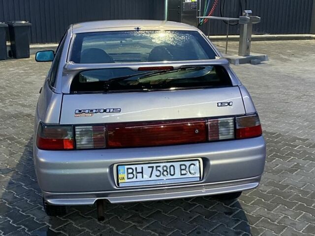 Серый ВАЗ 2112, объемом двигателя 1.6 л и пробегом 143 тыс. км за 1500 $, фото 3 на Automoto.ua