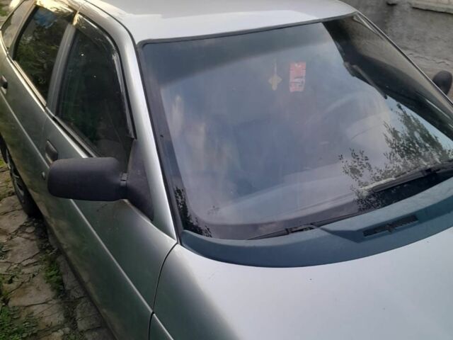 Серый ВАЗ 2112, объемом двигателя 1 л и пробегом 338 тыс. км за 1550 $, фото 4 на Automoto.ua