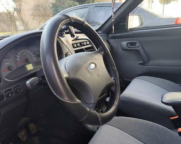 Серый ВАЗ 2112, объемом двигателя 1.6 л и пробегом 153 тыс. км за 2300 $, фото 11 на Automoto.ua