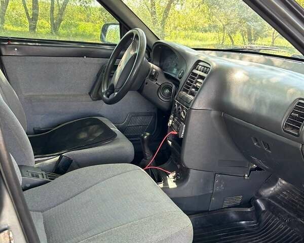 Серый ВАЗ 2112, объемом двигателя 1.6 л и пробегом 150 тыс. км за 1900 $, фото 5 на Automoto.ua