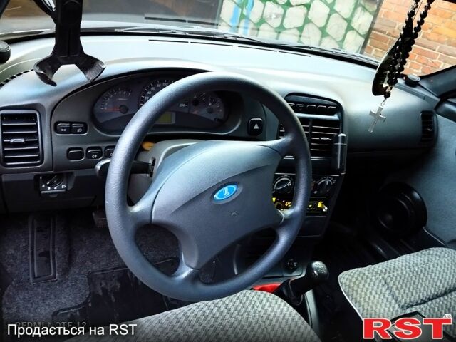 Серый ВАЗ 2112, объемом двигателя 16 л и пробегом 75 тыс. км за 3850 $, фото 4 на Automoto.ua