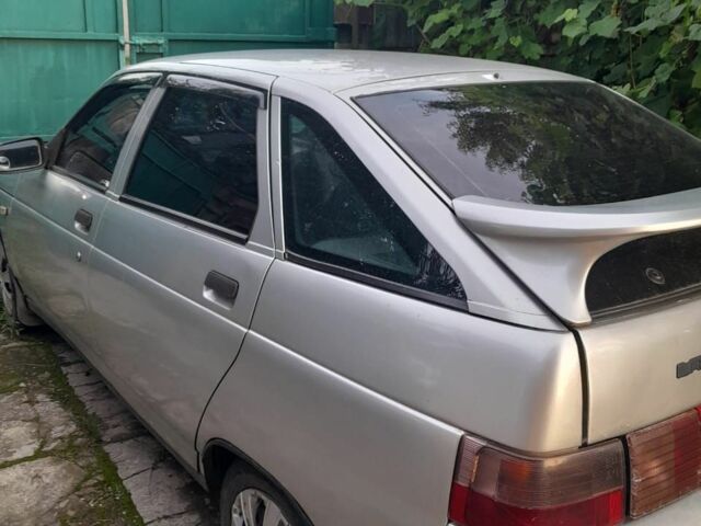 Серый ВАЗ 2112, объемом двигателя 1 л и пробегом 338 тыс. км за 1550 $, фото 1 на Automoto.ua