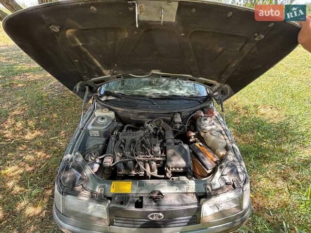 Серый ВАЗ 2112, объемом двигателя 1.6 л и пробегом 150 тыс. км за 1900 $, фото 12 на Automoto.ua